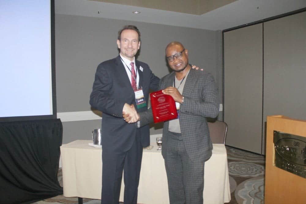 Dr. Umar Awarded for Educational Excellence by the ISHRS