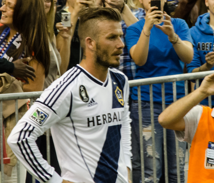 David Beckham wearing haircut to hide hair loss.